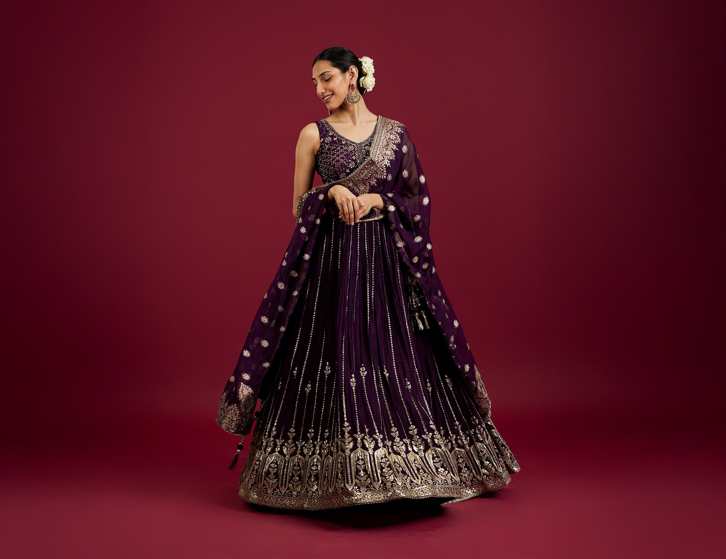A bride in purple stylish bridal lehenga for her wedding